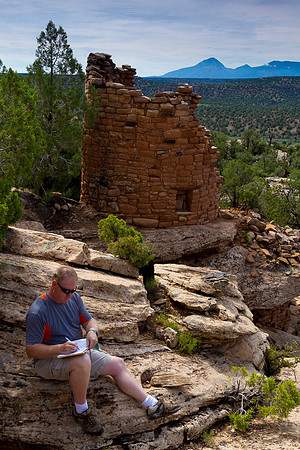 Steve journaling among Painted Hand Ruins